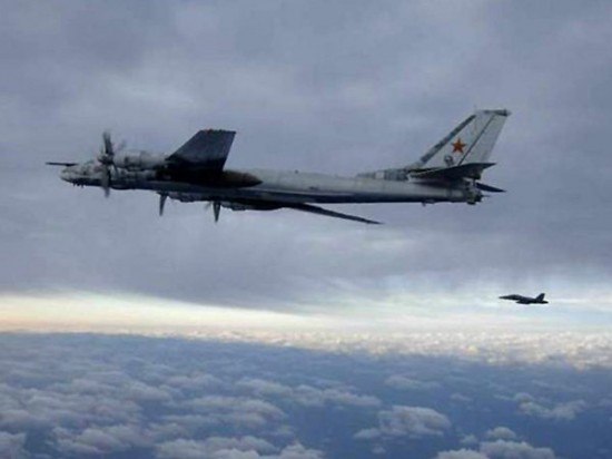 An-F-A-18-Hornet-escorts-a-Russian-Tu-95-Bear-long-range-bomber-aircraft